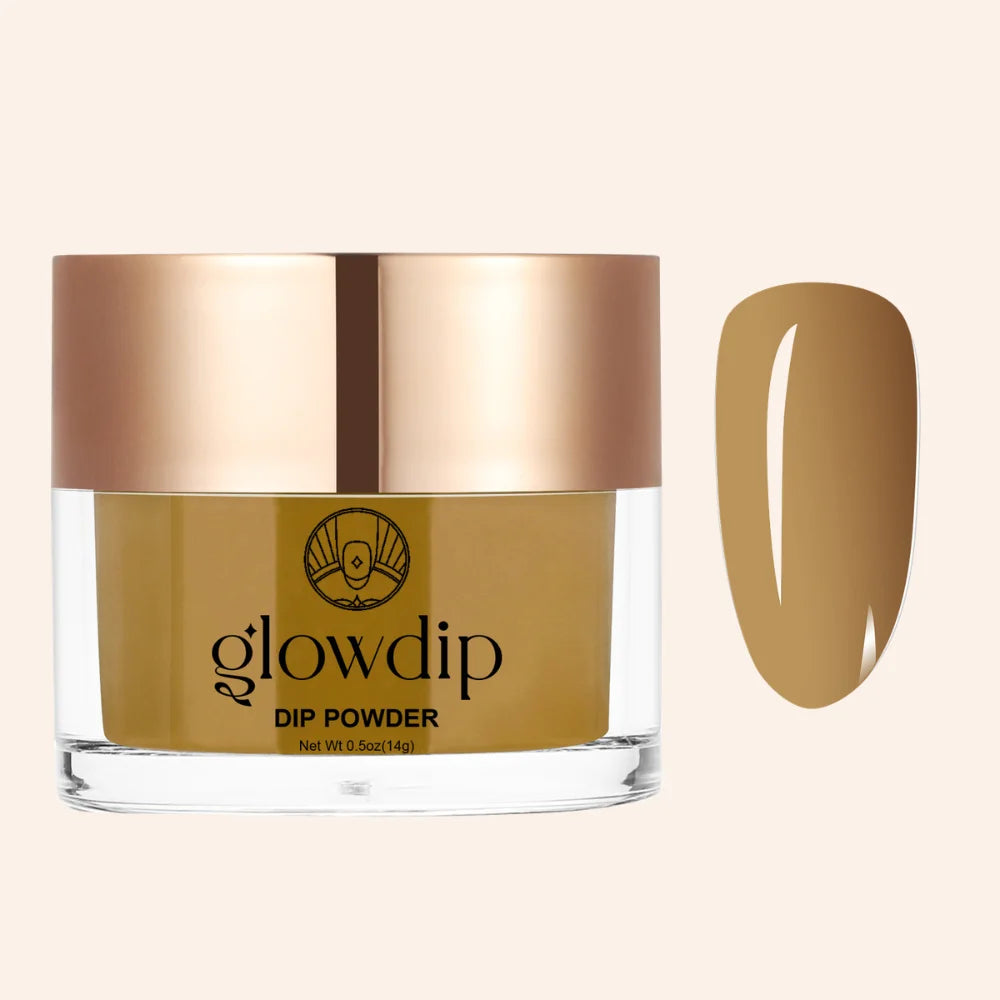 Een strak glazen potje met een roségouden deksel bevat glowdip dippoeder in de kleur golden drift