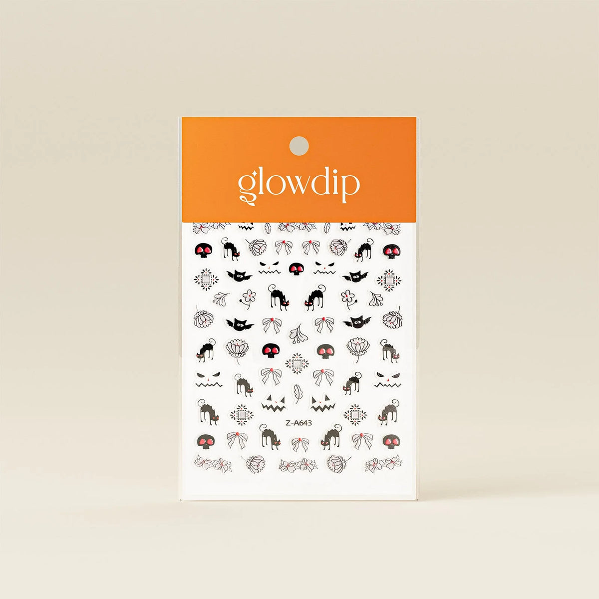 Oranje en witte glowdip halloween sticker met zwarte katten, schedels met rode ogen, pompoenen en strikjes in rasterpatroon